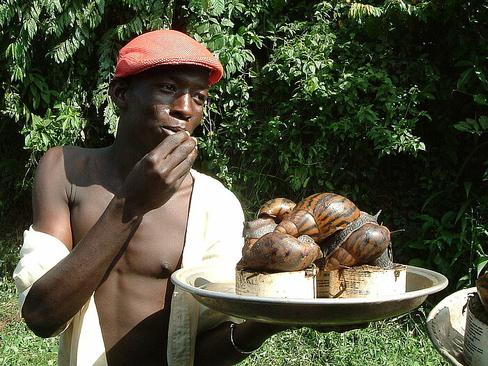 Schneckenverkäufer in Ghana