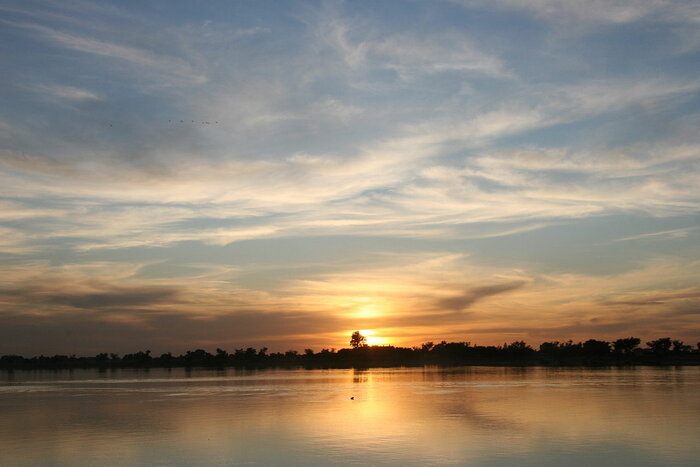 Sonnenuntergang am Fluss Bani