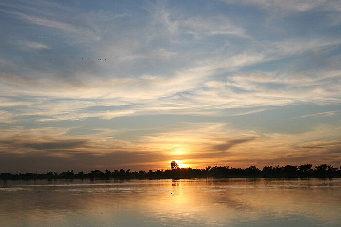 Sonnenuntergang am Fluss Bani