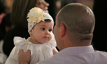 Religion in Venezuela: Baby in katholischer Kirche